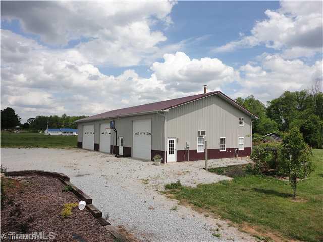 2185 South River Church Road Woodleaf, NC 27054 - Photo 11 of 15 Outbuilding. Awesome 40 x 80 outbuilding with loft/kitchen area and full bath. Radiant heat thru floors in a 40 x 20 area. 3 oversized bays. This shop will wow you!