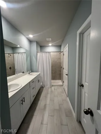 a bathroom with a toilet and a sink