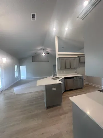 a large room with wooden floor