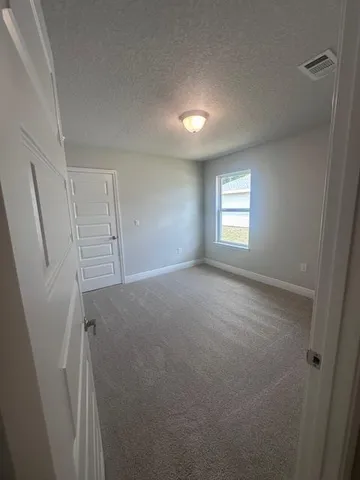 a view of empty room with window