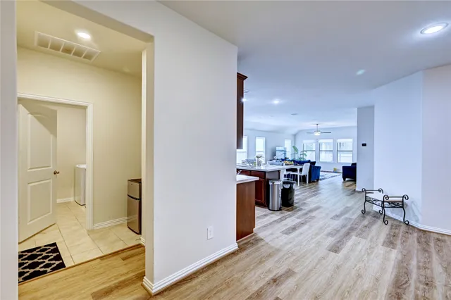 a kitchen with stainless steel appliances granite countertop a stove and a microwave