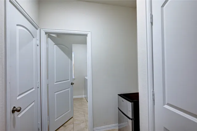 a stove sitting inside of a kitchen with stainless steel appliances