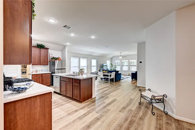 a view of a living room and dining room