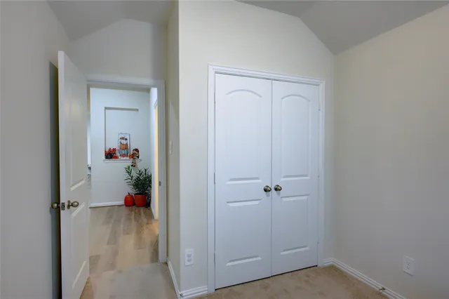 a room that has a table and a chair in it