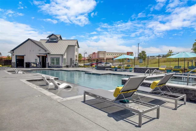 a kitchen with stove and cabinets