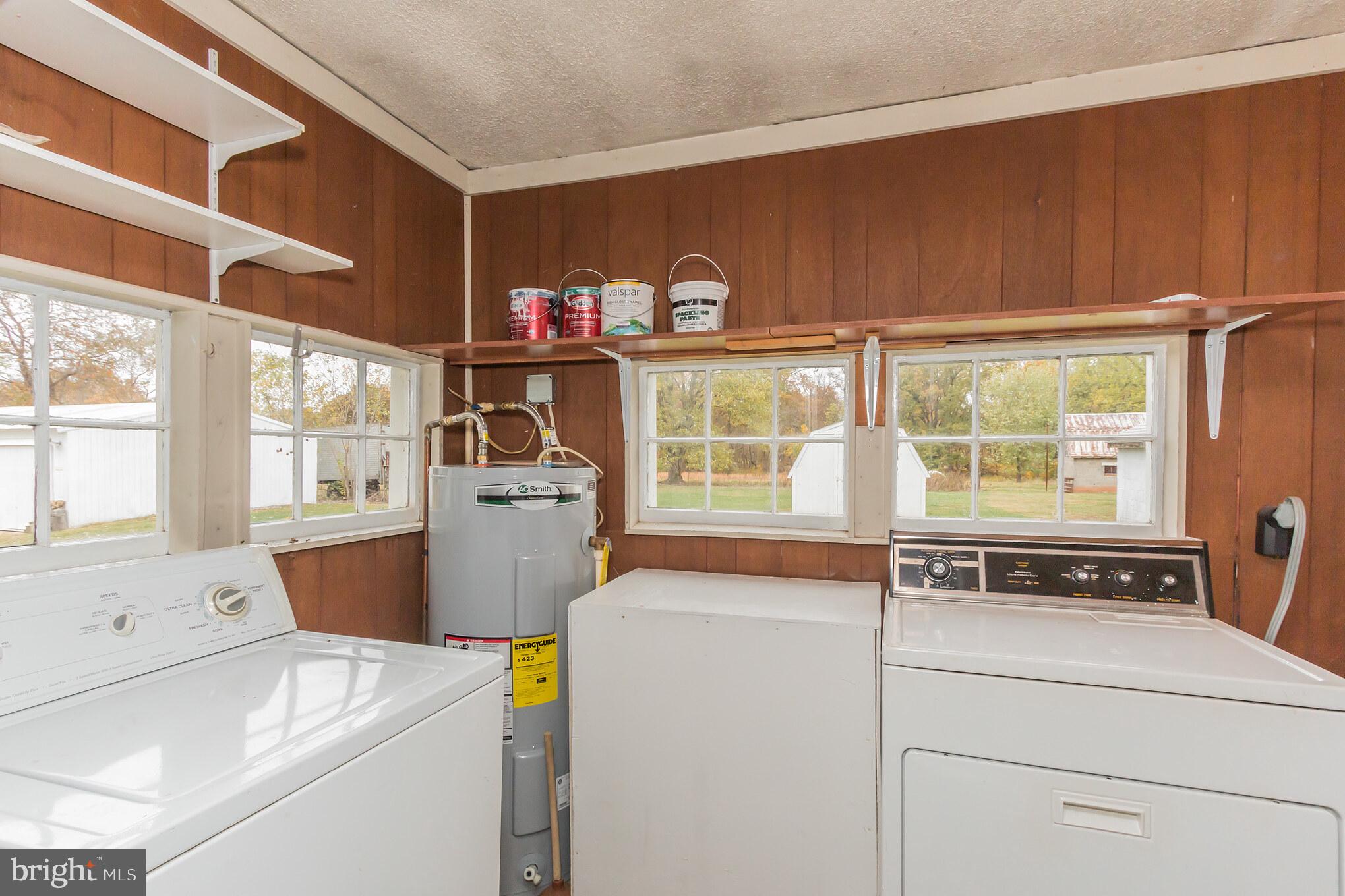 20625 Whites Ferry Road Poolesville, MD 20837 - Photo 29 of 38 20629 Laundry room convenient to kitchen