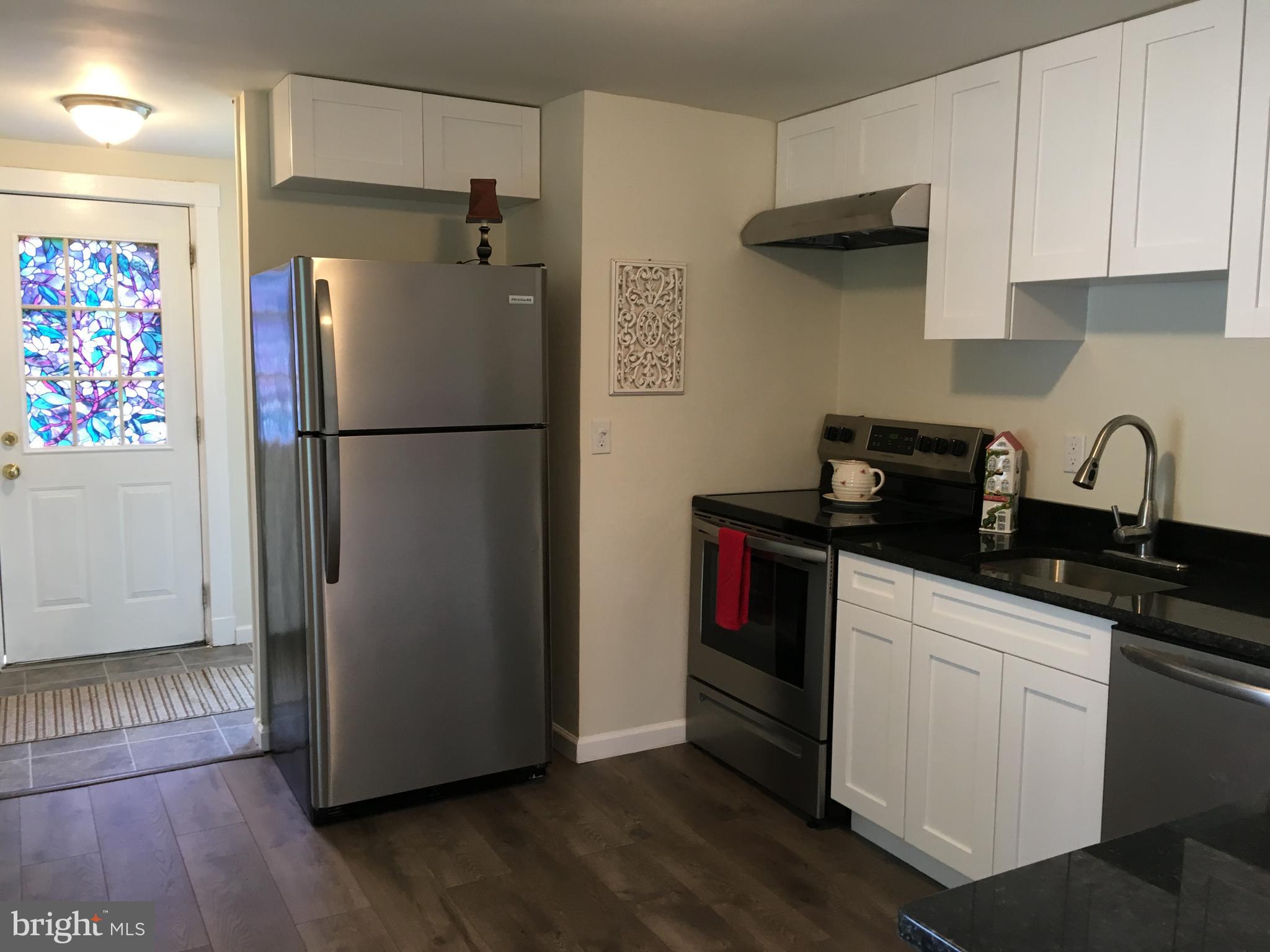 20625 Whites Ferry Road Poolesville, MD 20837 - Photo 7 of 38 New Kitchen with Washer/Dryer near back door