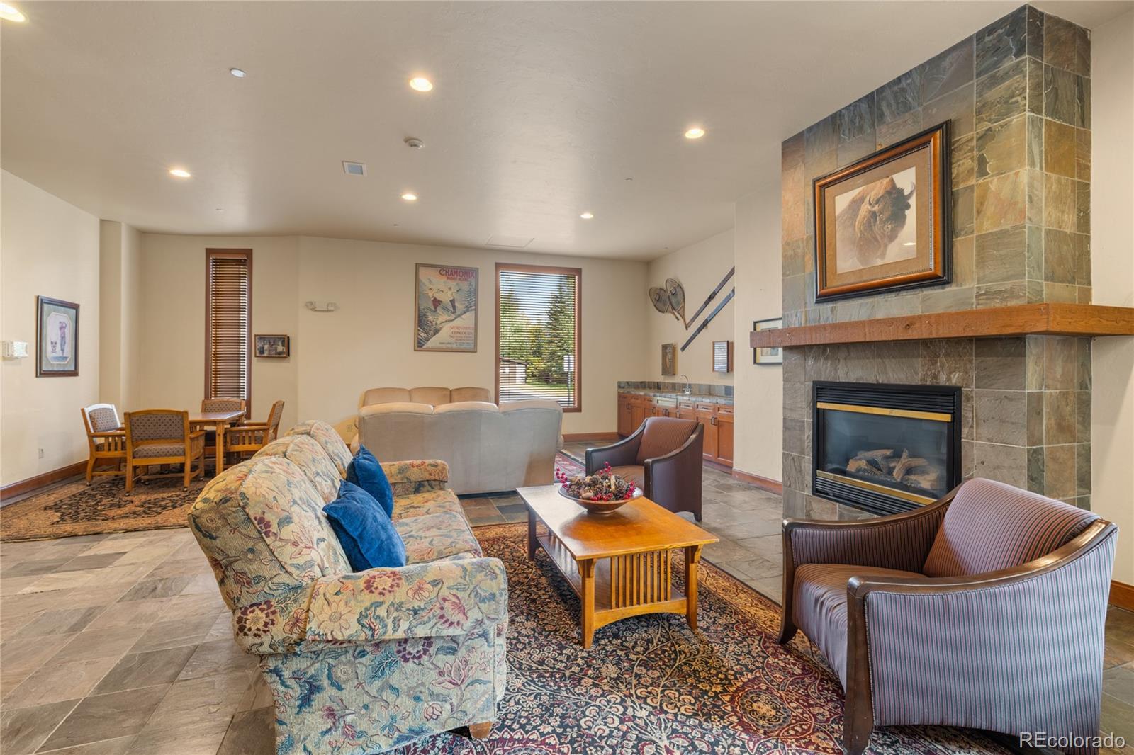 22787 Highway 6, Unit 209 Dillon, CO 80435 - Photo 33 of 49 a living room with furniture a fireplace and a window