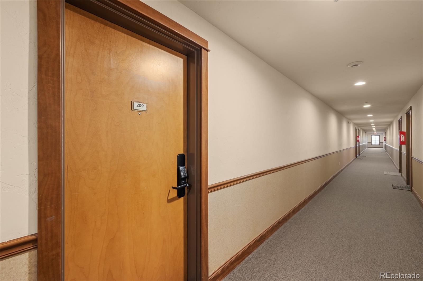 22787 Highway 6, Unit 209 Dillon, CO 80435 - Photo 45 of 49 a view of hallway with stairs