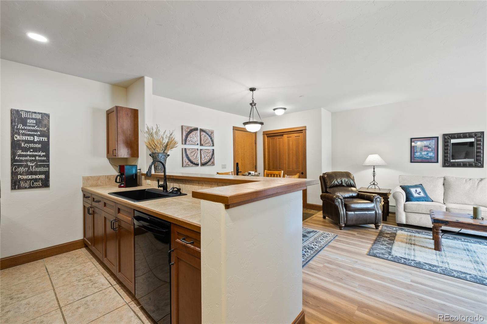 22787 Highway 6, Unit 209 Dillon, CO 80435 - Photo 9 of 49 a kitchen with a stove and a sink