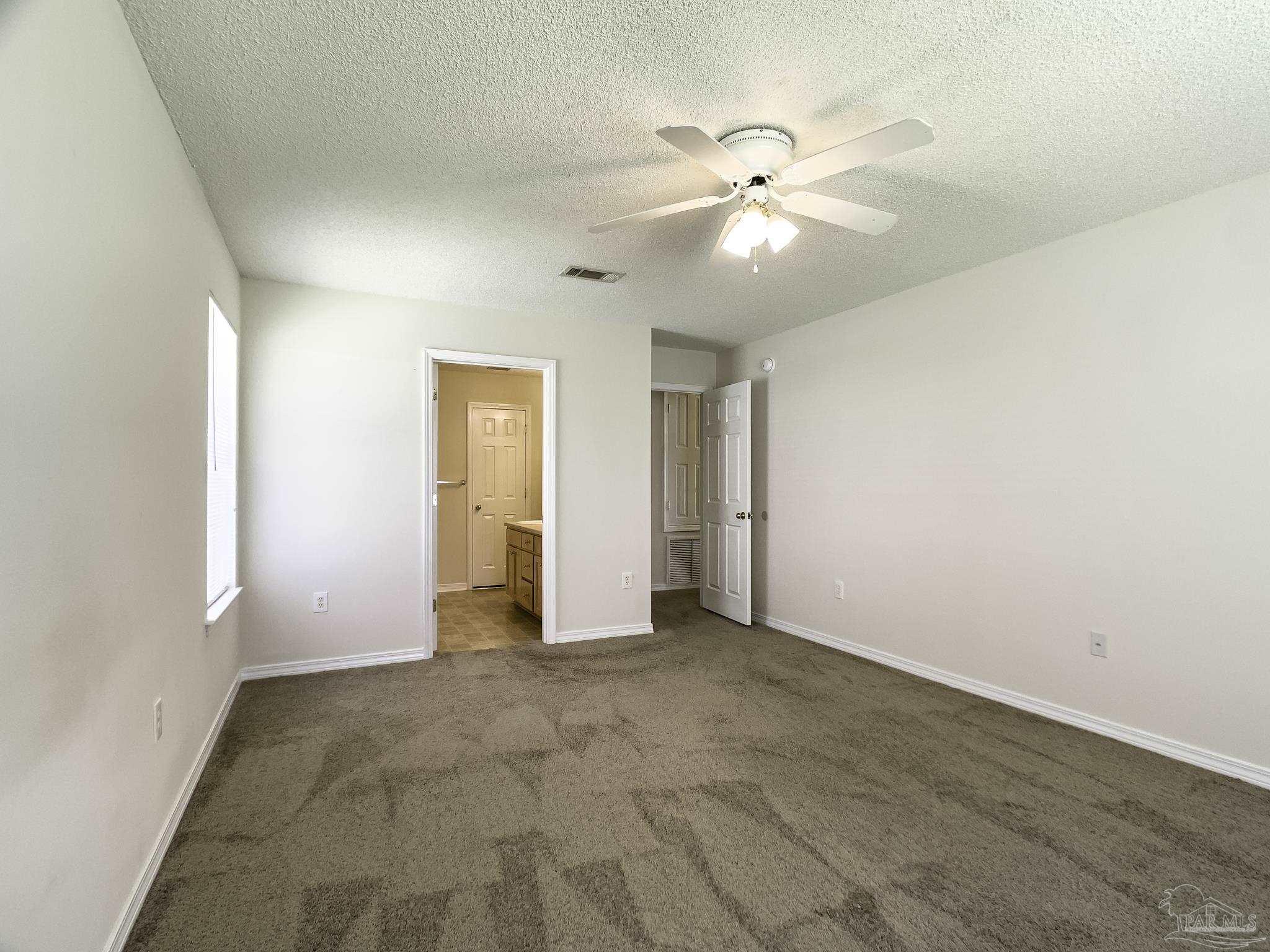 1267 Sterling Point Place Gulf Breeze, FL 32563 - Photo 12 of 27 wooden floor in an empty room