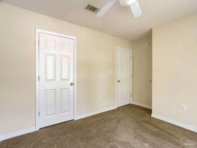a view of a bathroom with a glass door