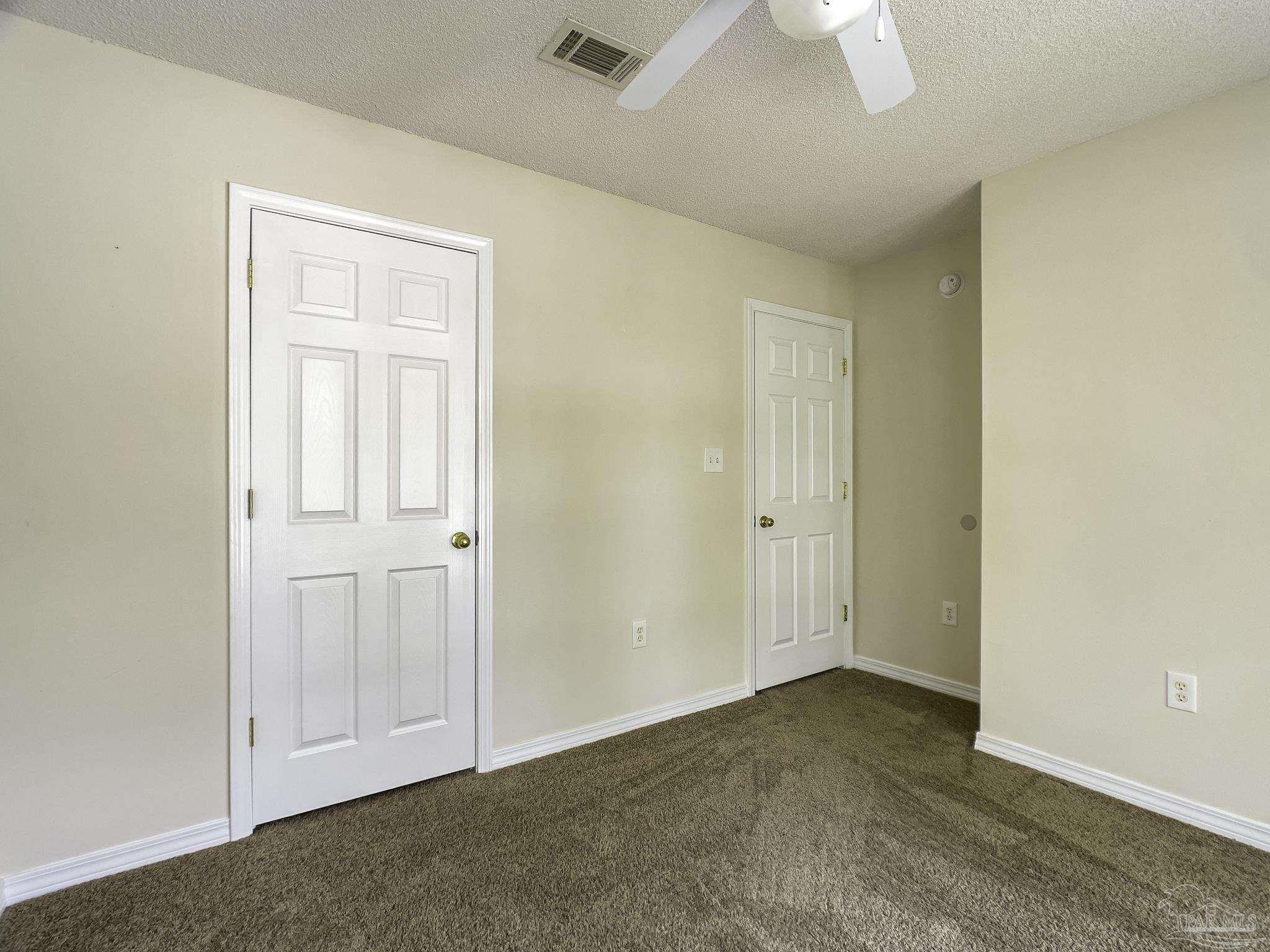 1267 Sterling Point Place Gulf Breeze, FL 32563 - Photo 19 of 27 an empty room with closet area