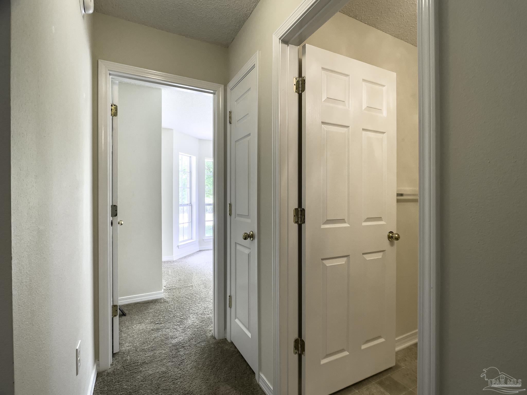 1267 Sterling Point Place Gulf Breeze, FL 32563 - Photo 20 of 27 a view of a bathroom with a glass door