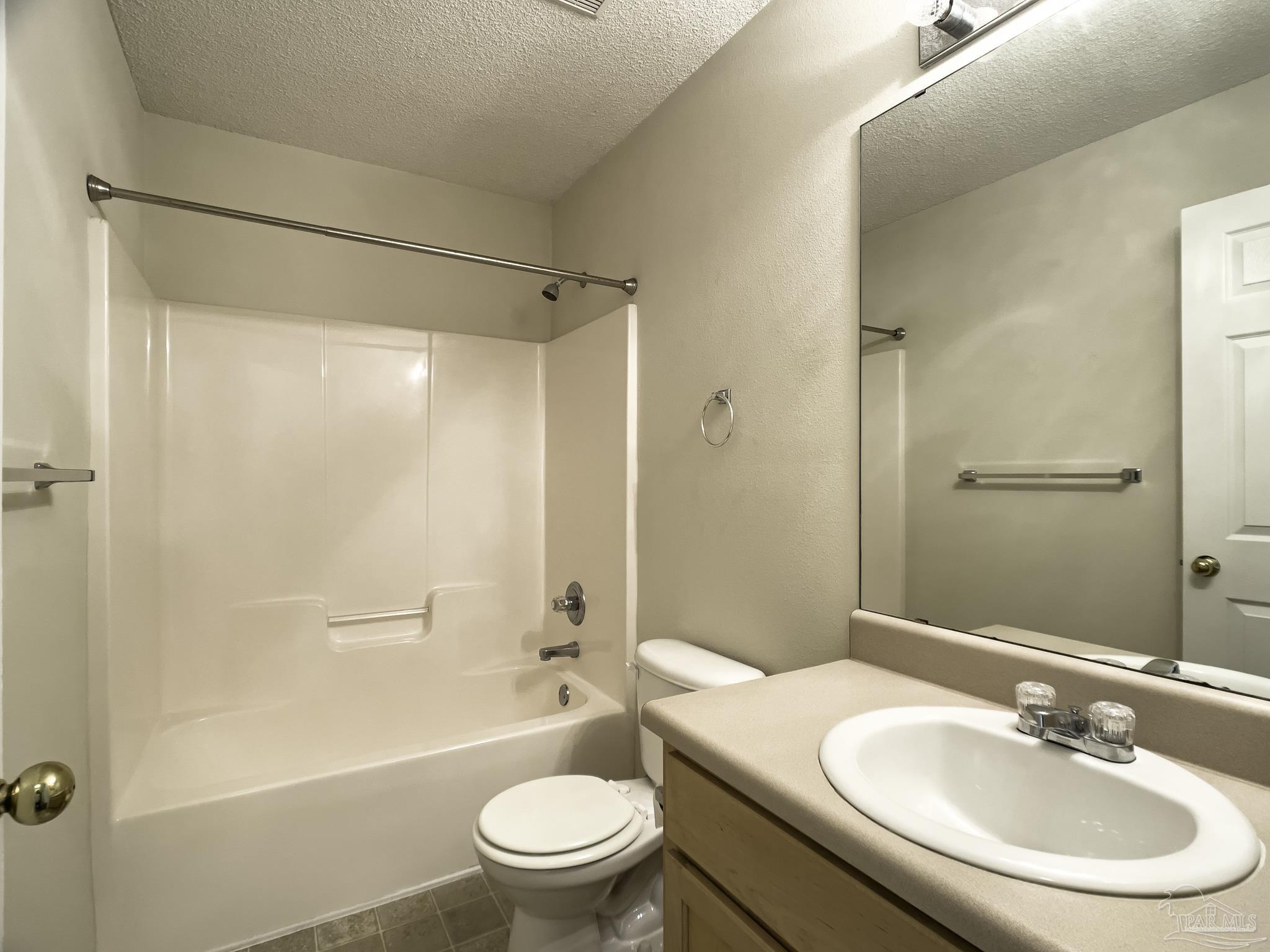 1267 Sterling Point Place Gulf Breeze, FL 32563 - Photo 21 of 27 a bathroom with a sink toilet and shower
