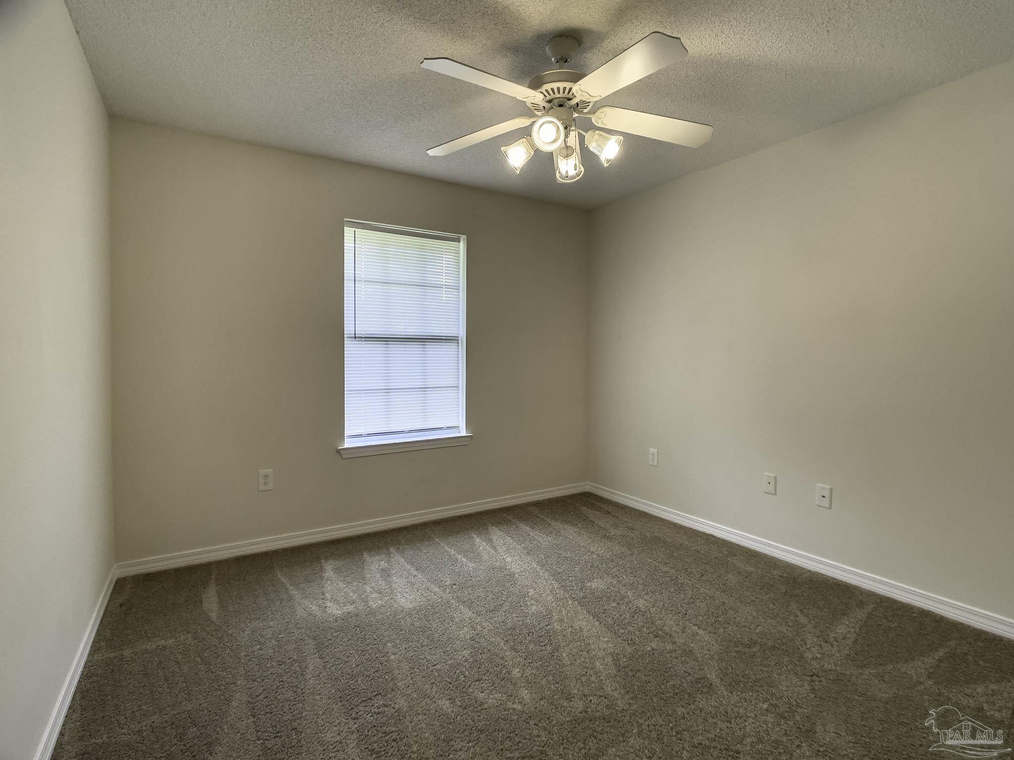 1267 Sterling Point Place Gulf Breeze, FL 32563 - Photo 22 of 27 an empty room with a window