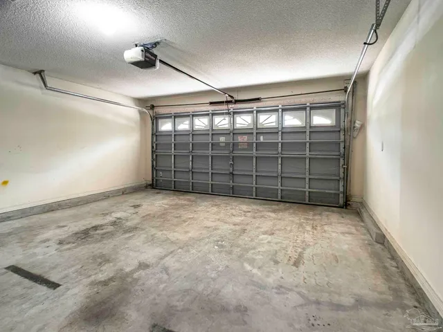 a view of a swimming pool with an outdoor space and seating area