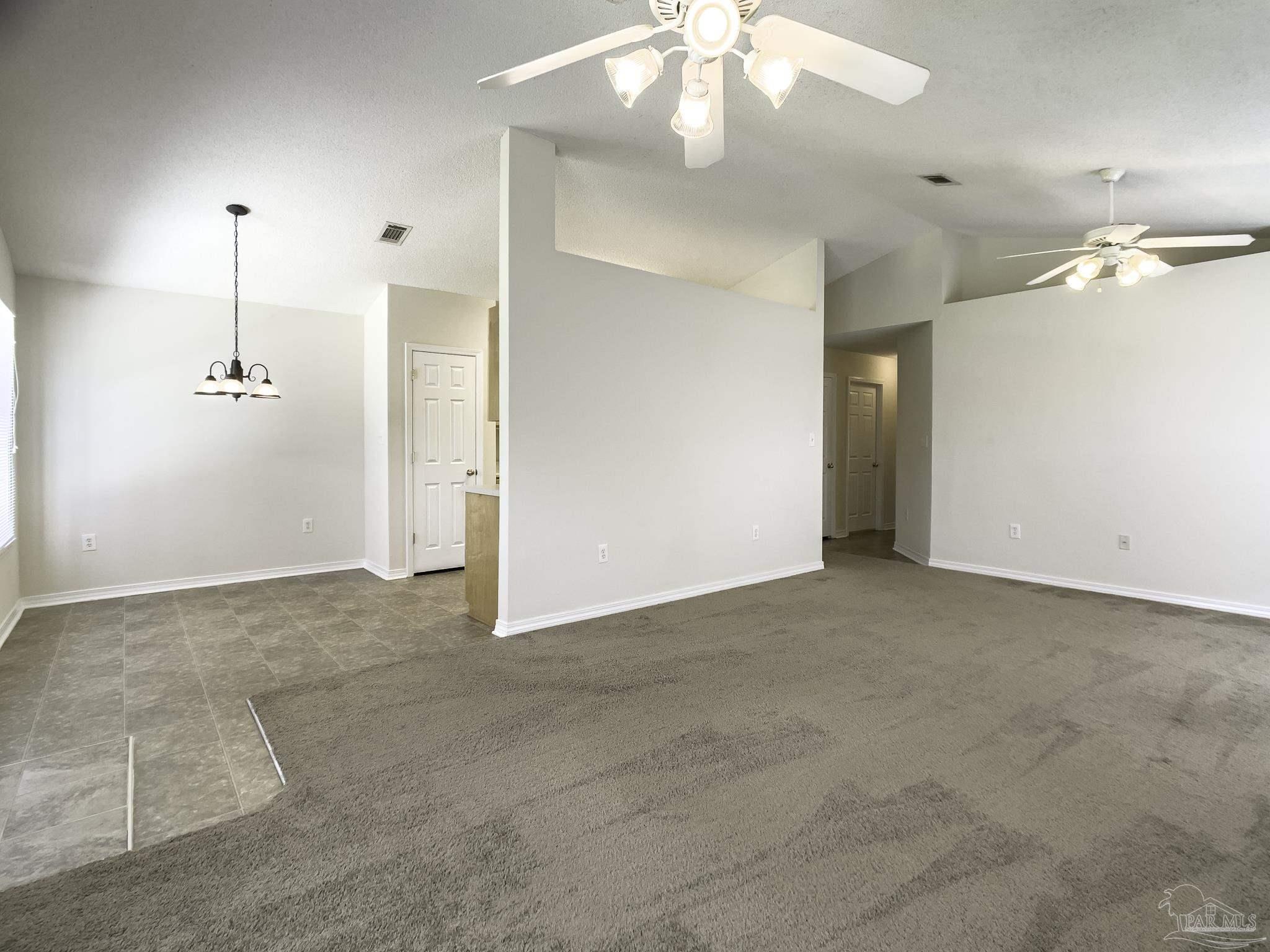 1267 Sterling Point Place Gulf Breeze, FL 32563 - Photo 3 of 27 a view of empty room with a ceiling fan