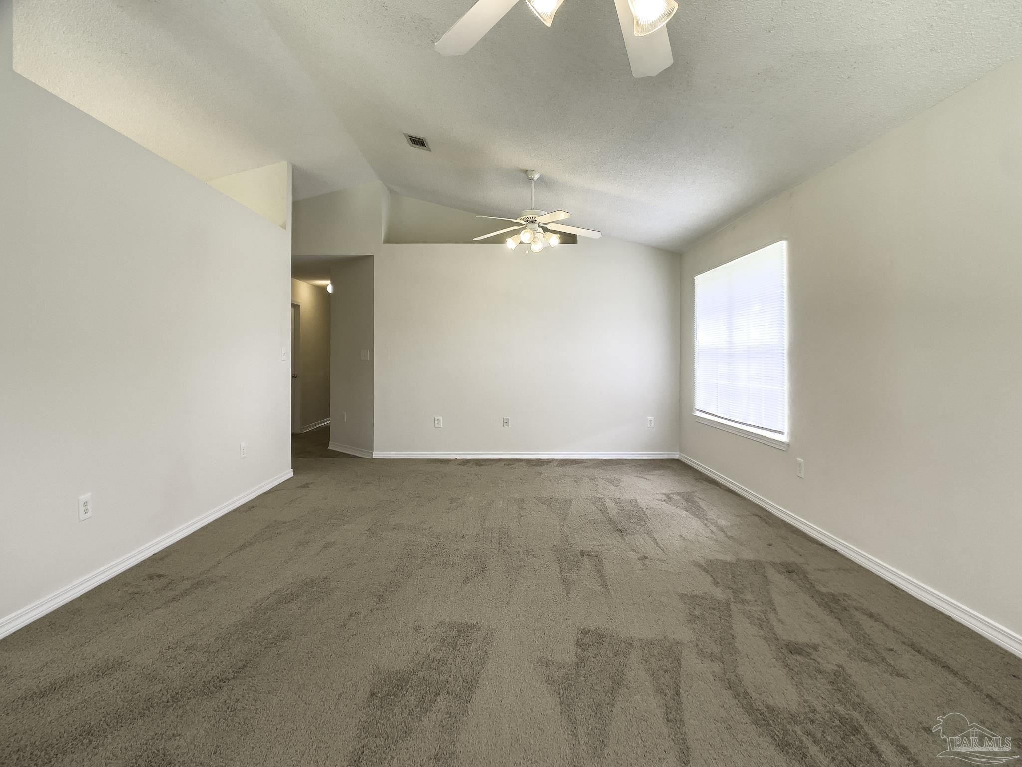 1267 Sterling Point Place Gulf Breeze, FL 32563 - Photo 6 of 27 an empty room with windows and entrance