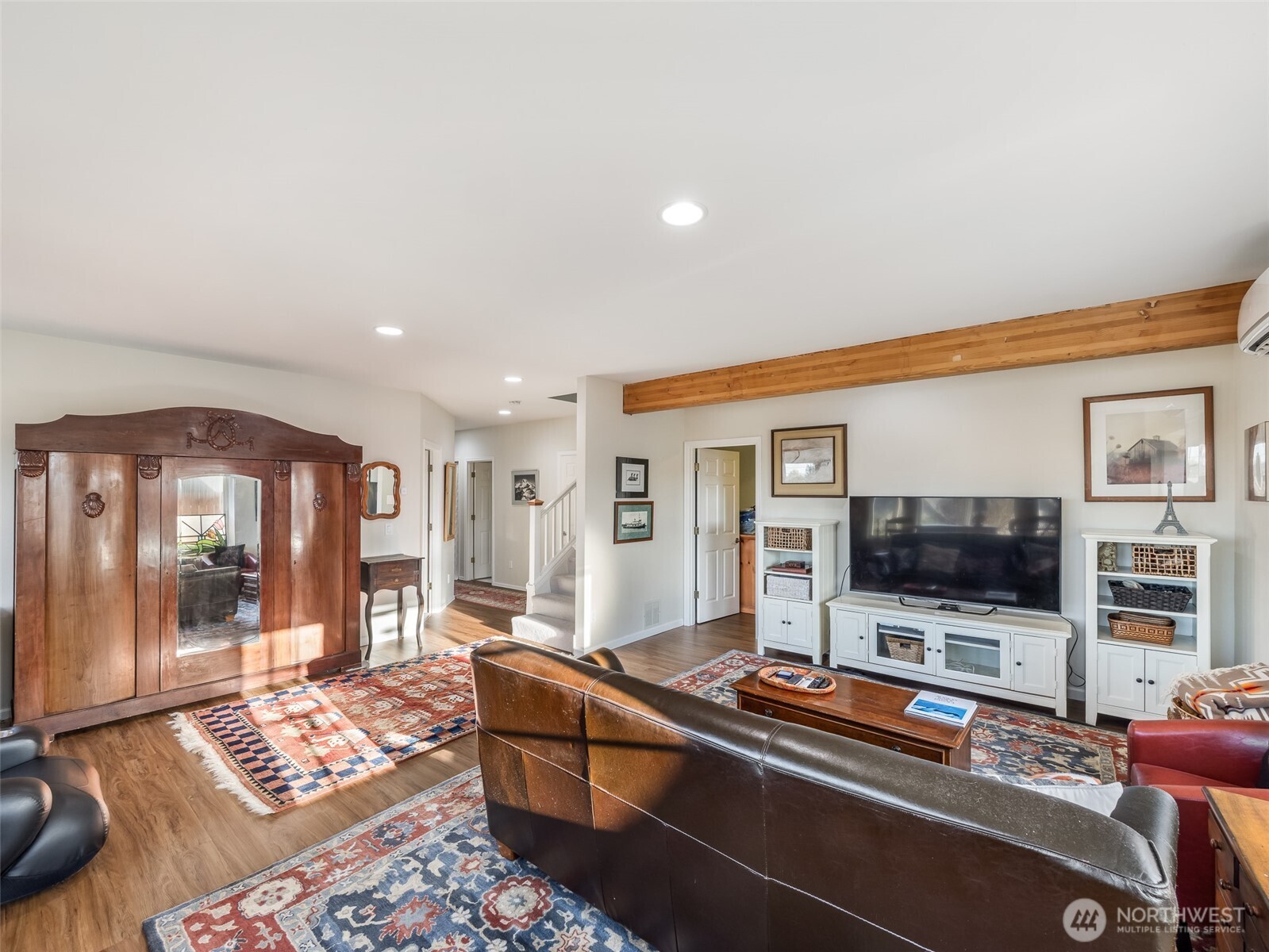 6716 Skipley Road Snohomish, WA 98290 - Photo 25 of 39 a living room with furniture and a flat screen tv