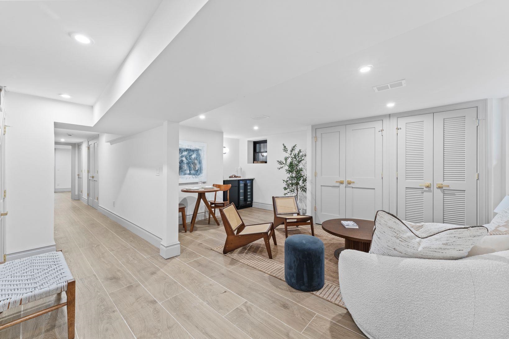 83 Liberty Place, Unit 1 Weehawken, NJ 07086 - Photo 24 of 39 a living room with furniture and a table