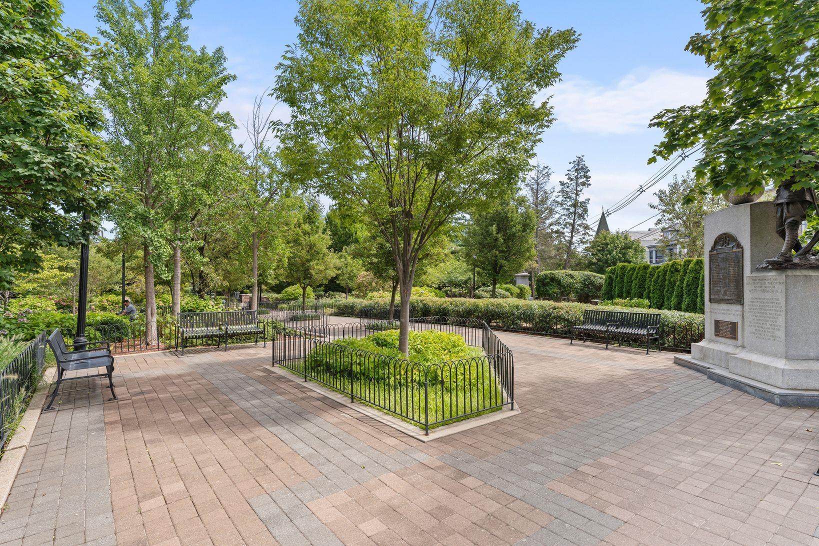 83 Liberty Place, Unit 1 Weehawken, NJ 07086 - Photo 38 of 39 a view of a backyard with sitting area
