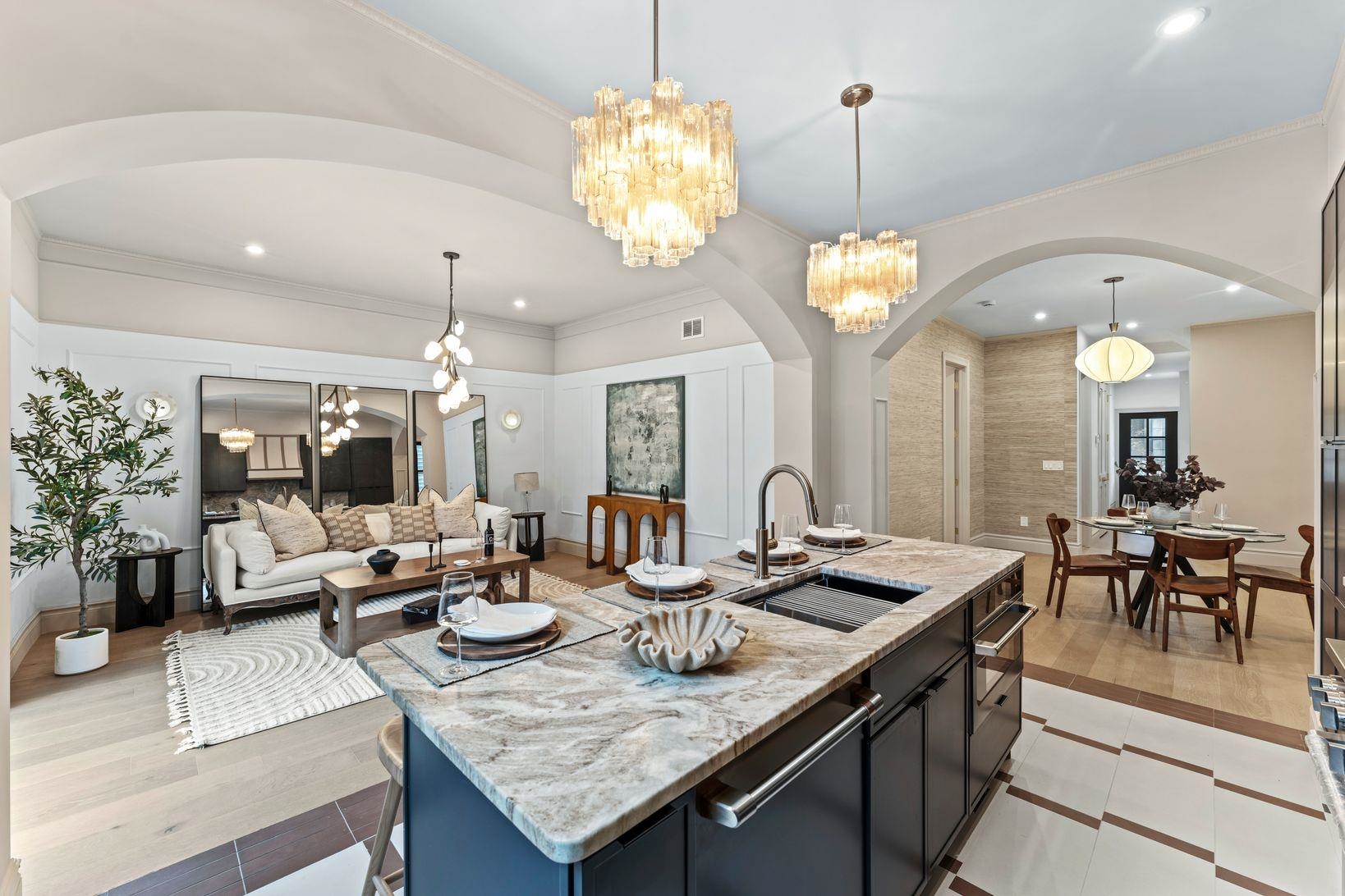 83 Liberty Place, Unit 1 Weehawken, NJ 07086 - Photo 8 of 39 a view of a dining room furniture and a chandelier