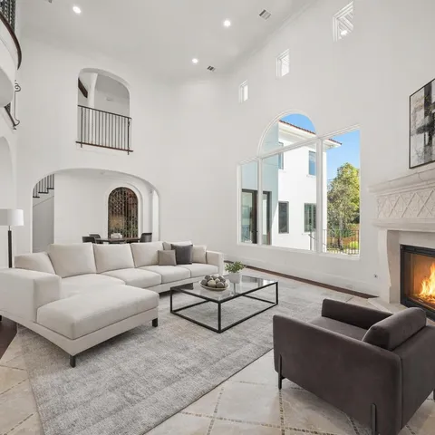 a kitchen with granite countertop a stove top oven