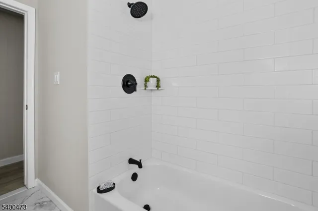 a bathroom with a bathtub