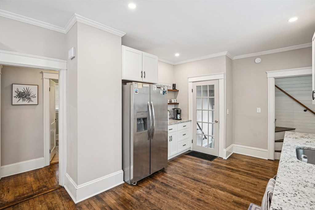14 Balder Road Worcester, MA 01605 - Photo 13 of 34 a view of a kitchen with refrigerator and wooden floor