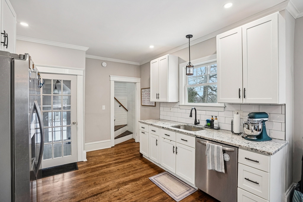 14 Balder Road Worcester, MA 01605 - Photo 14 of 34 a kitchen with a sink stove and cabinets