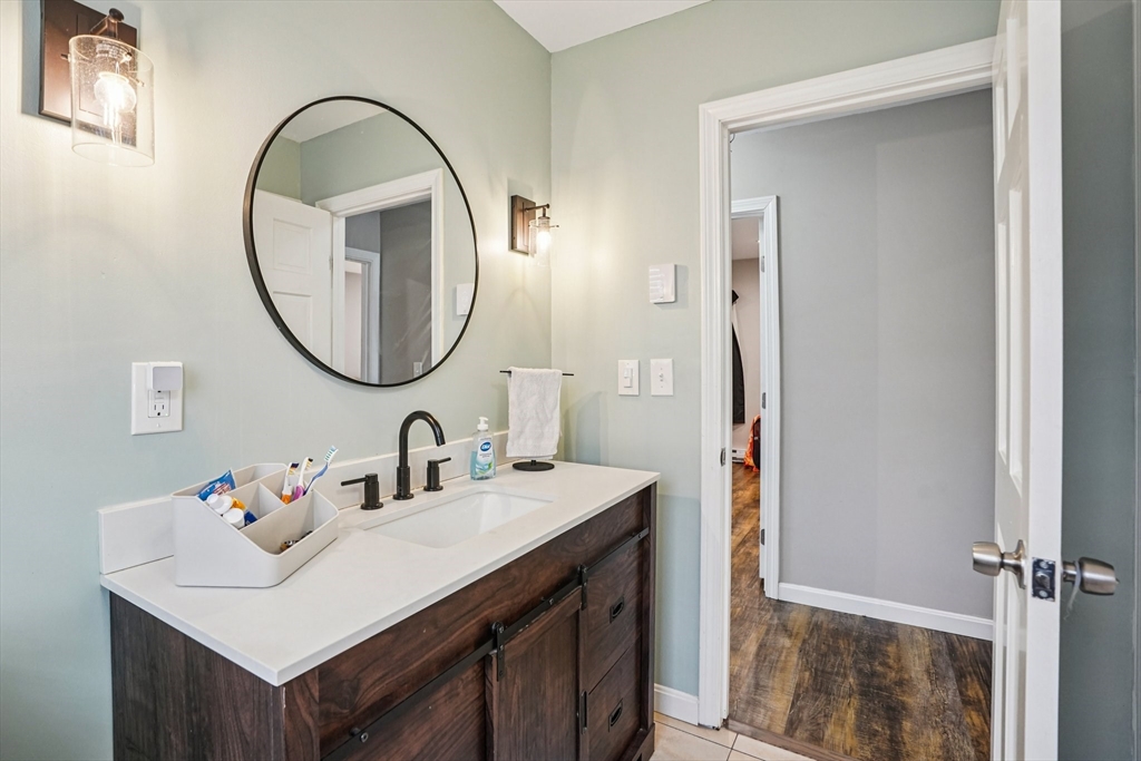 14 Balder Road Worcester, MA 01605 - Photo 27 of 34 a bathroom with a sink and a mirror