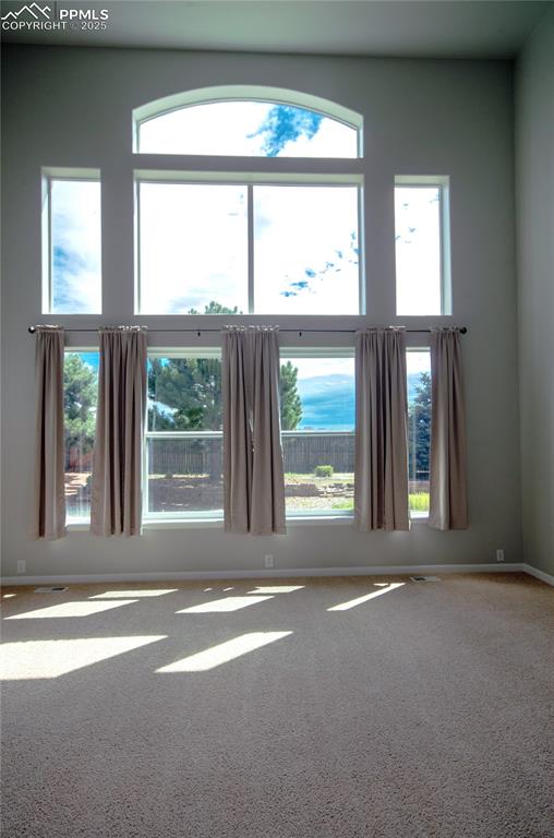 9443 St.George Road Peyton, CO 80831 - Photo 13 of 45 a view of a room that has a bed
