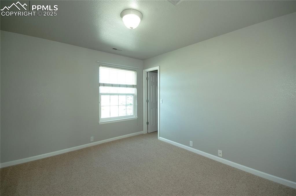 9443 St.George Road Peyton, CO 80831 - Photo 36 of 45 an empty room with a window