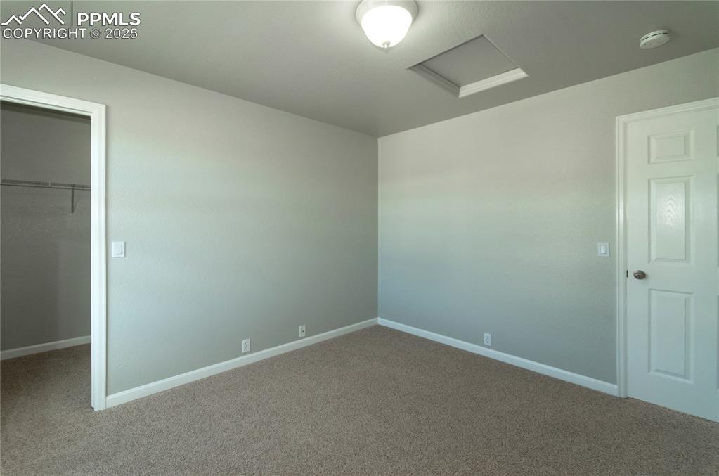 9443 St.George Road Peyton, CO 80831 - Photo 37 of 45 an empty room with an entryway
