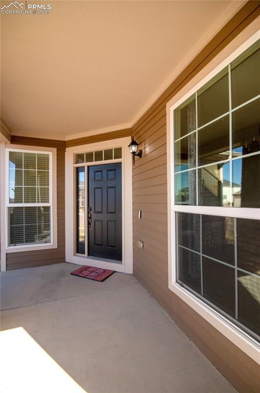9443 St.George Road Peyton, CO 80831 - Photo 4 of 45 a view of an empty room with a large window