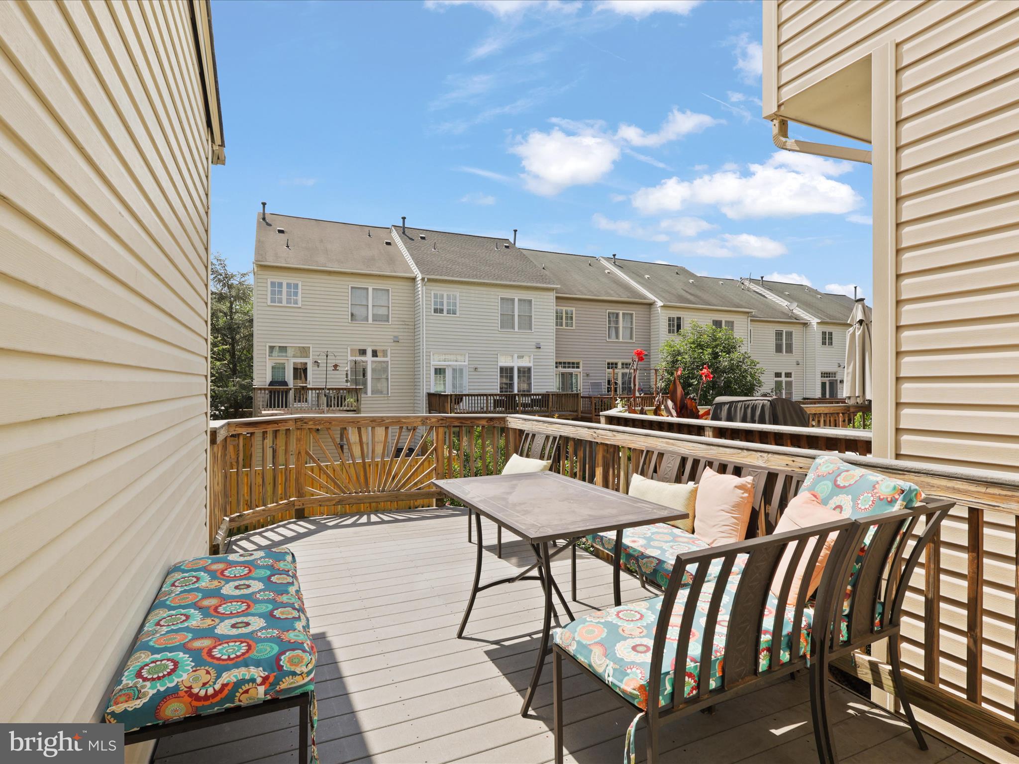 25449 Morse Drive Chantilly, VA 20152 - Photo 13 of 46 a balcony with table and chairs