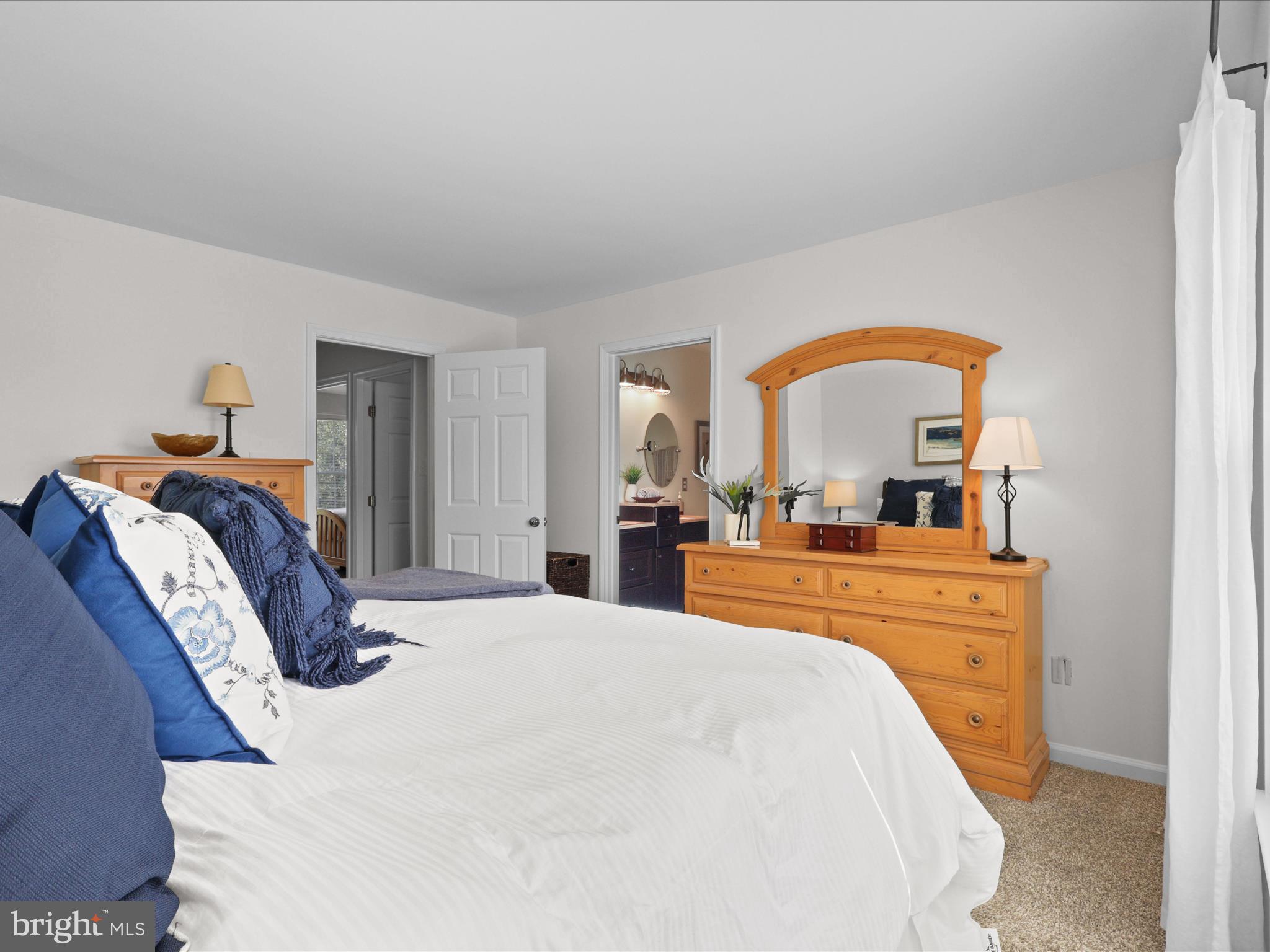 25449 Morse Drive Chantilly, VA 20152 - Photo 15 of 46 a bedroom with a bed and a large window
