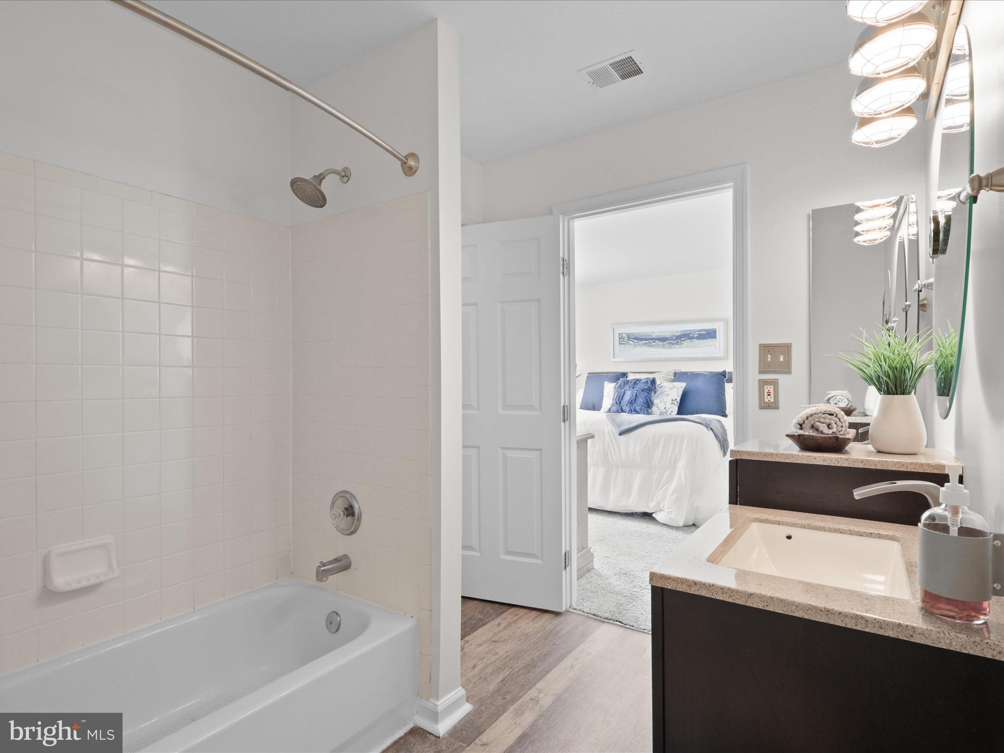 25449 Morse Drive Chantilly, VA 20152 - Photo 17 of 46 a living room with furniture and a potted plant