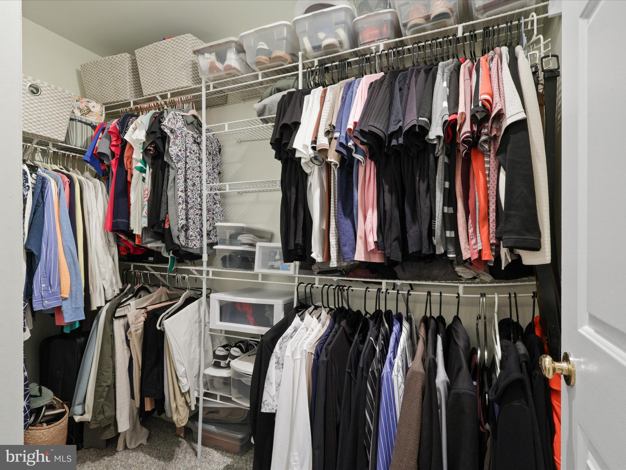 25449 Morse Drive Chantilly, VA 20152 - Photo 18 of 46 a view of walk in closet with clothes
