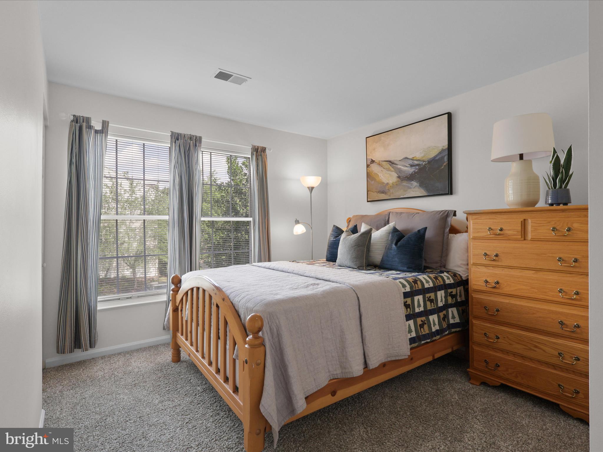 25449 Morse Drive Chantilly, VA 20152 - Photo 20 of 46 a bed room with a bed and a window