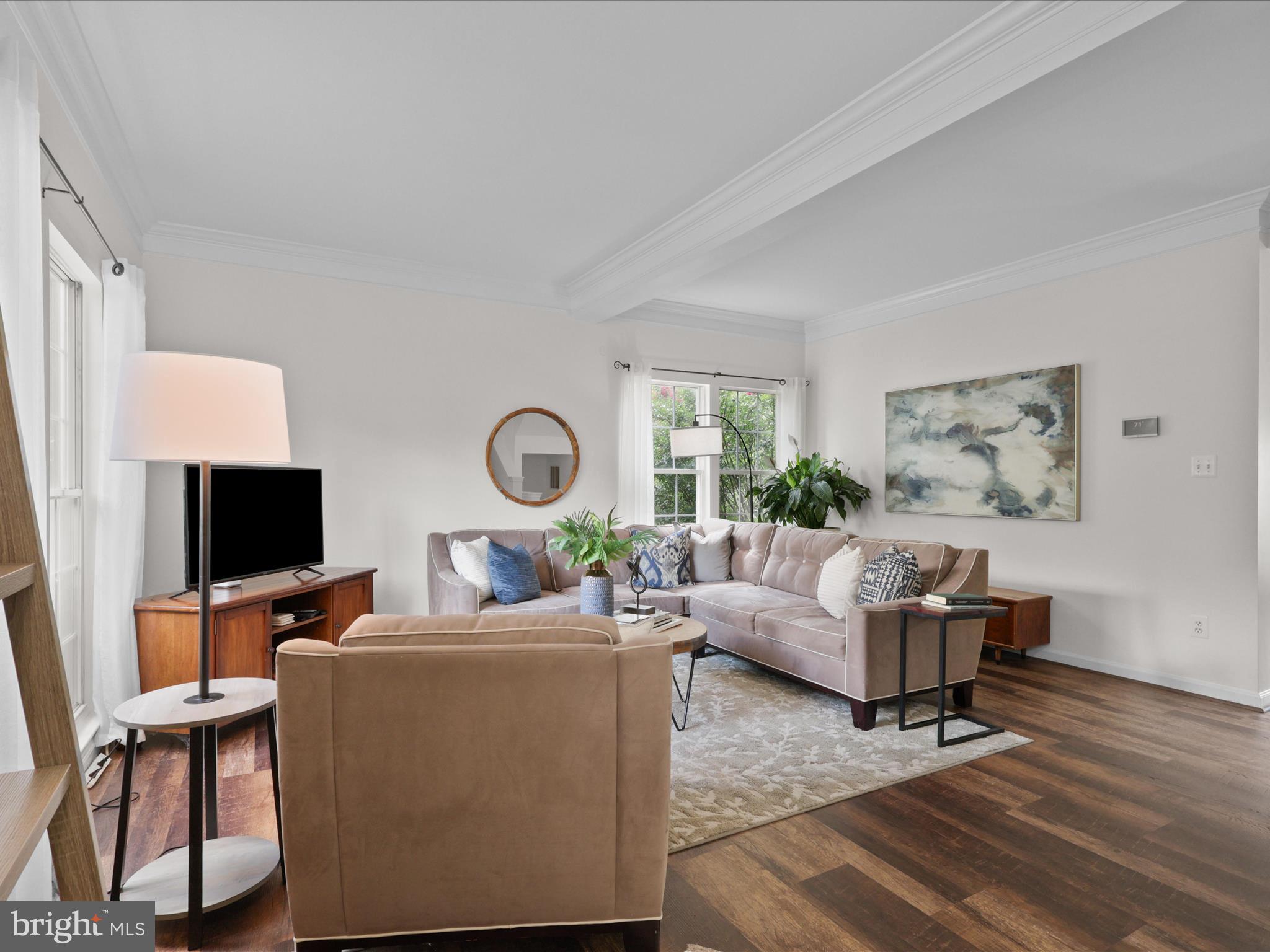 25449 Morse Drive Chantilly, VA 20152 - Photo 2 of 46 a living room with furniture a fireplace and a flat screen tv