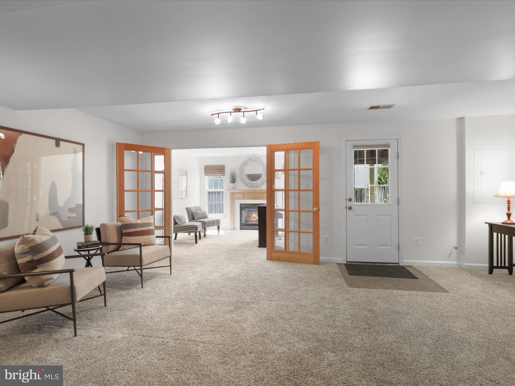 25449 Morse Drive Chantilly, VA 20152 - Photo 24 of 46 wooden floor chandelier and windows in a room