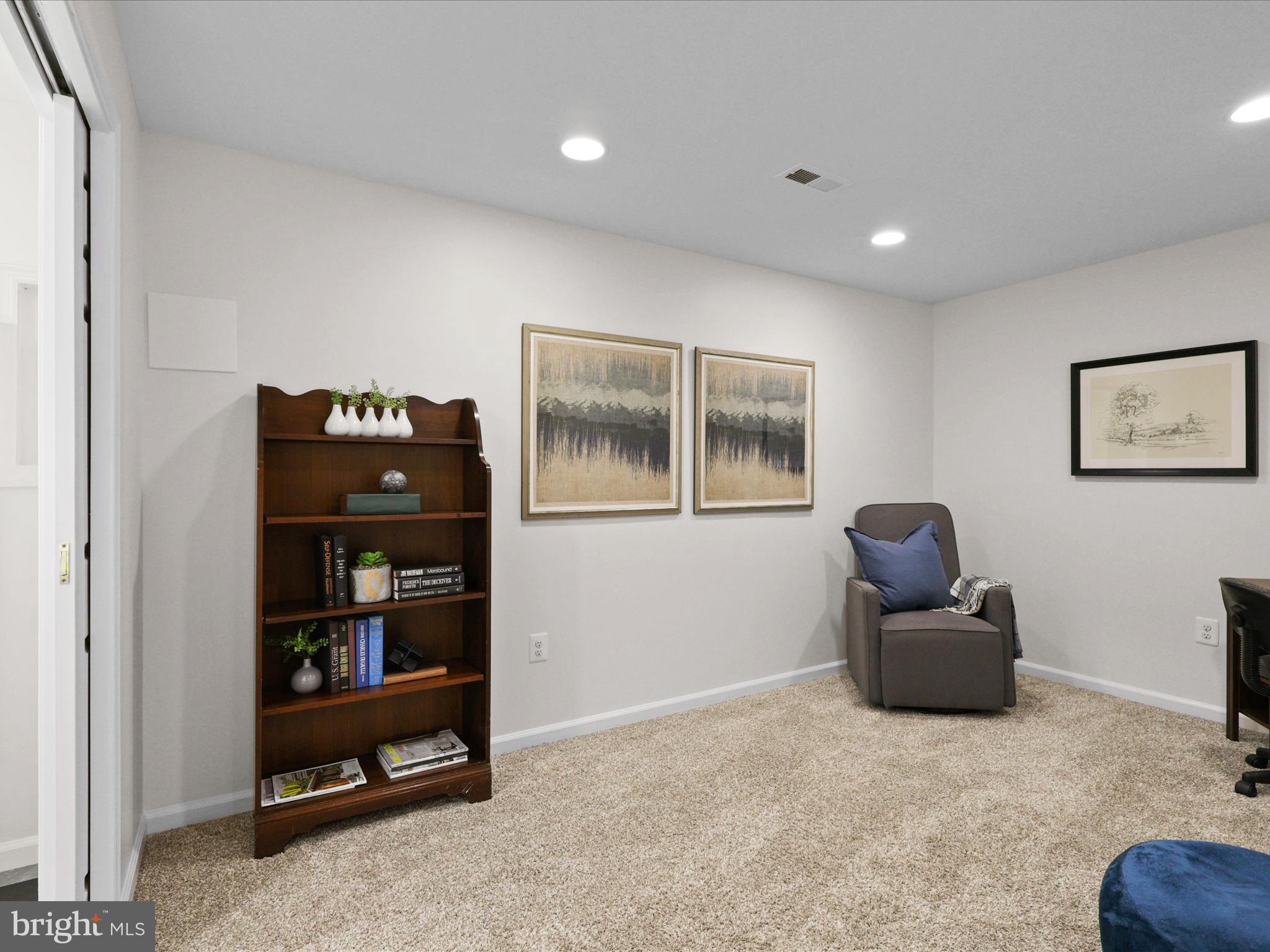25449 Morse Drive Chantilly, VA 20152 - Photo 28 of 46 a living room with furniture and baby crib