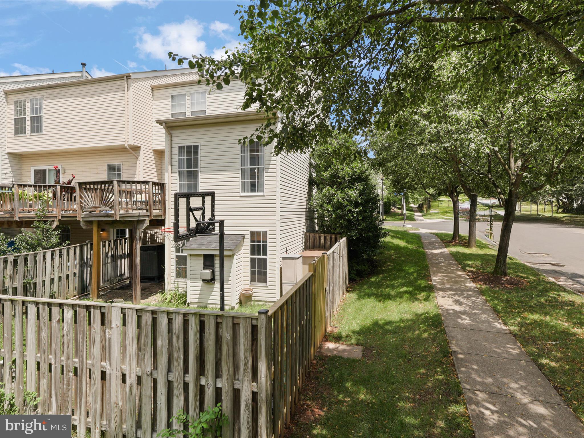 25449 Morse Drive Chantilly, VA 20152 - Photo 34 of 46 a view of a house with backyard and trees