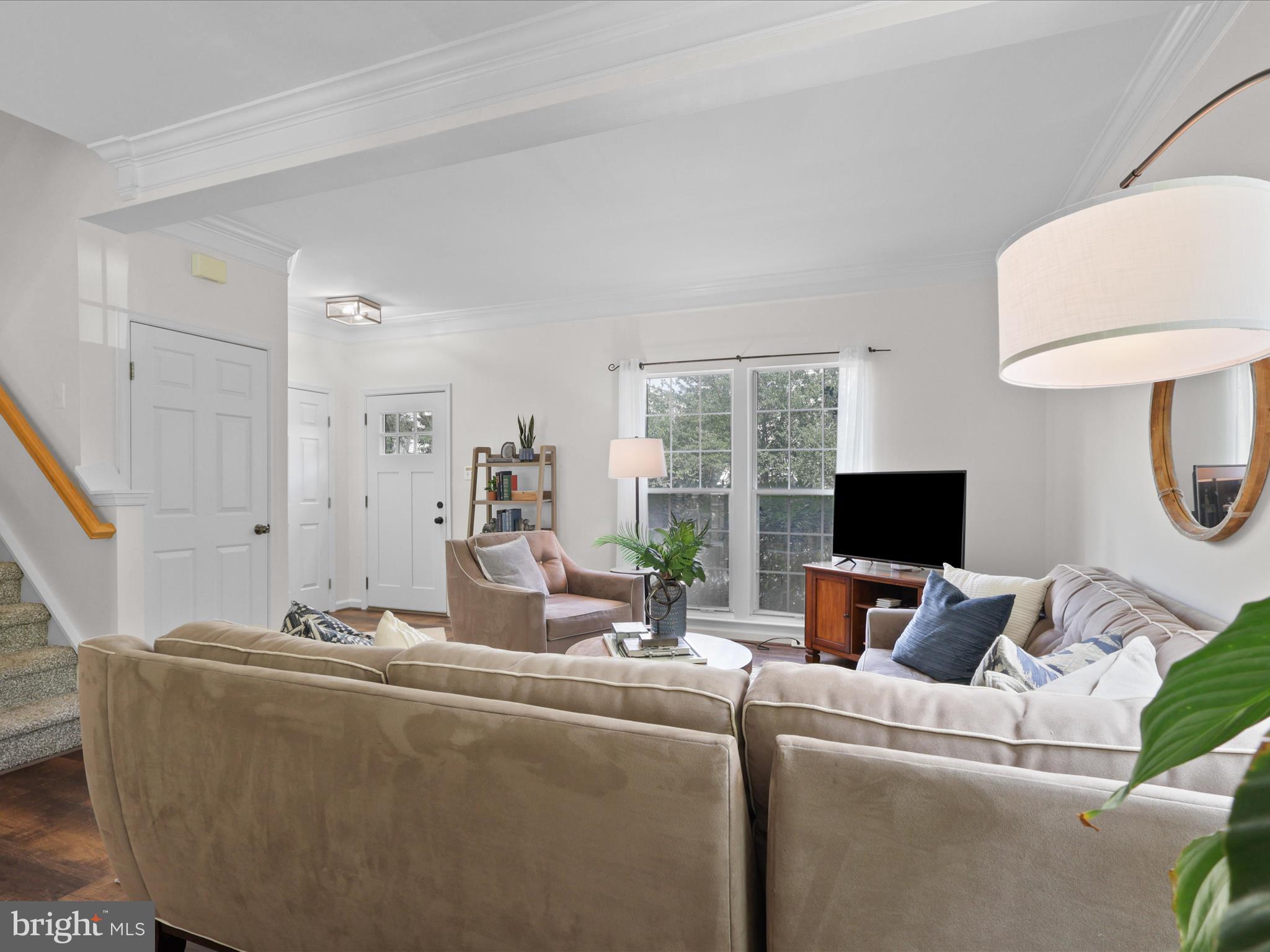 25449 Morse Drive Chantilly, VA 20152 - Photo 4 of 46 a living room with furniture and a flat screen tv