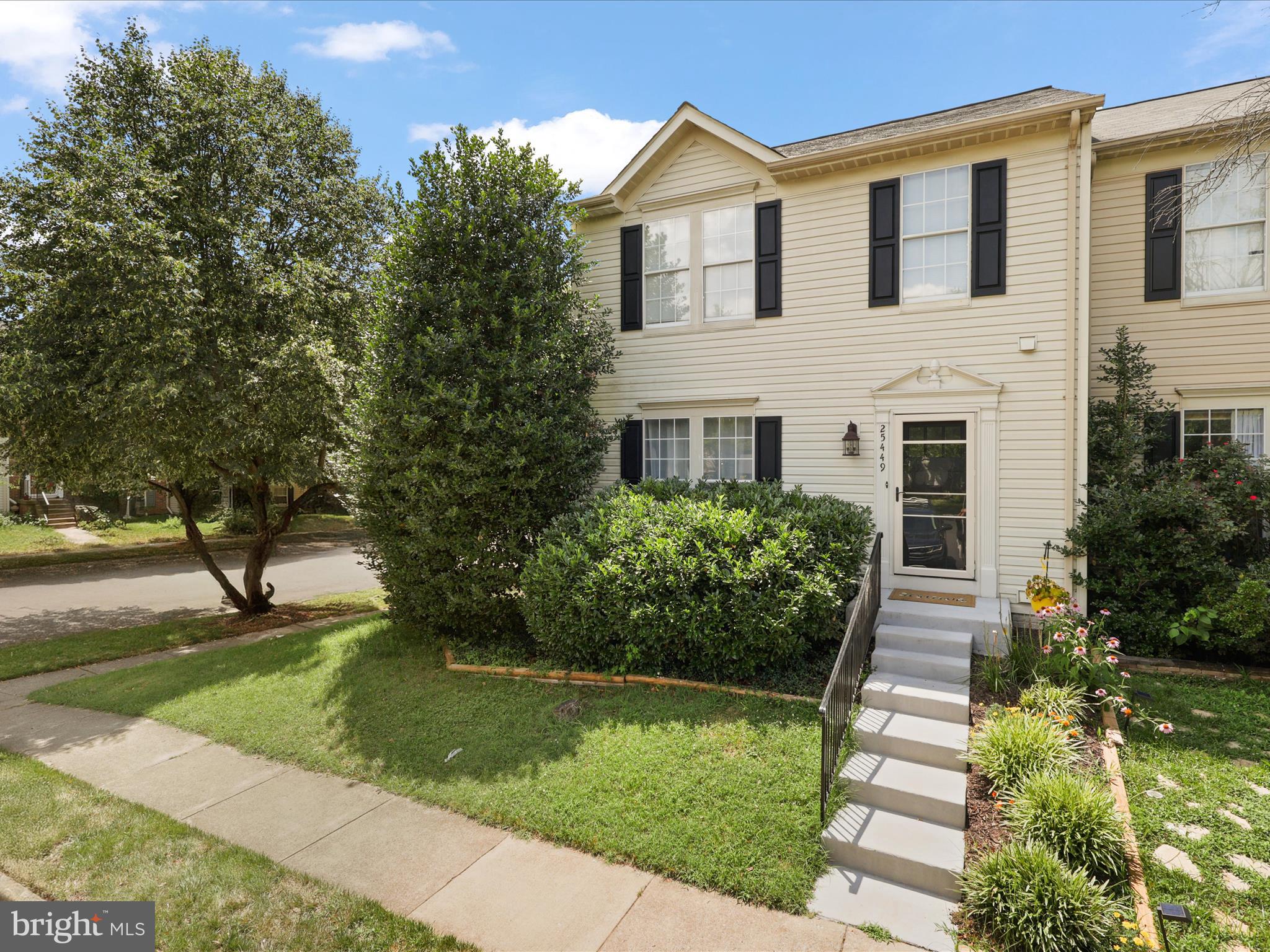 25449 Morse Drive Chantilly, VA 20152 - Photo 43 of 46 a front view of a house with a yard