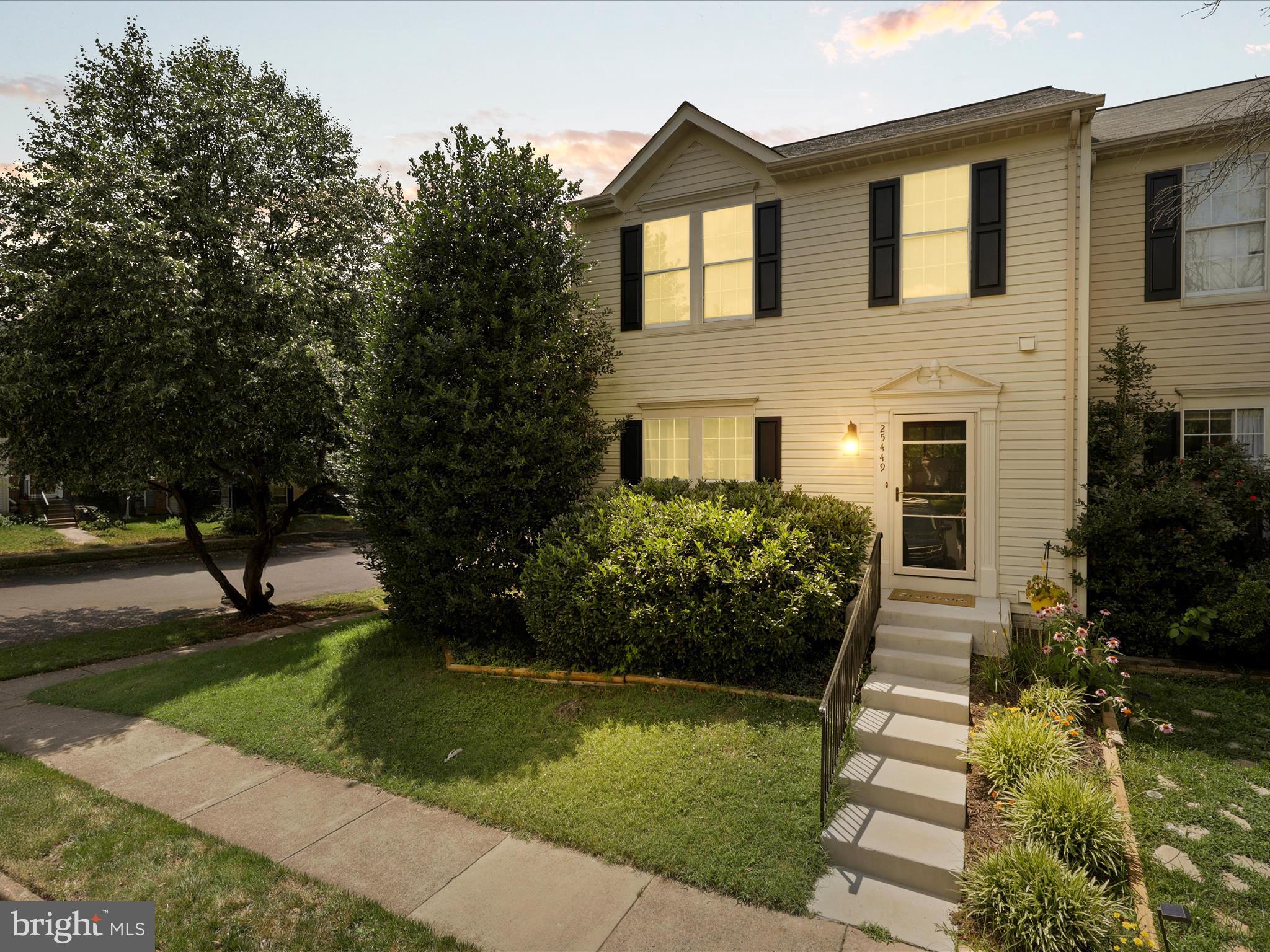25449 Morse Drive Chantilly, VA 20152 - Photo 44 of 46 a front view of a house with garden
