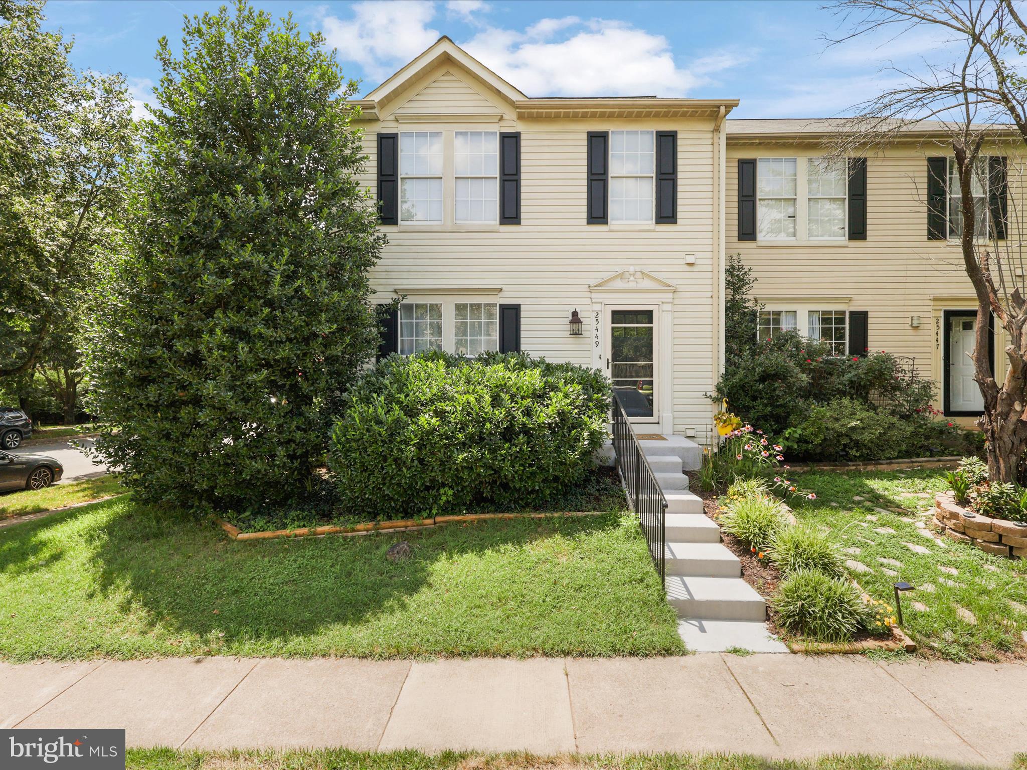 25449 Morse Drive Chantilly, VA 20152 - Photo 45 of 46 a front view of a house with a yard