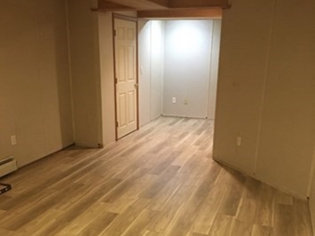 45 Walker Road Ware, MA 01082 - Photo 24 of 42 a view of an empty room with wooden floor